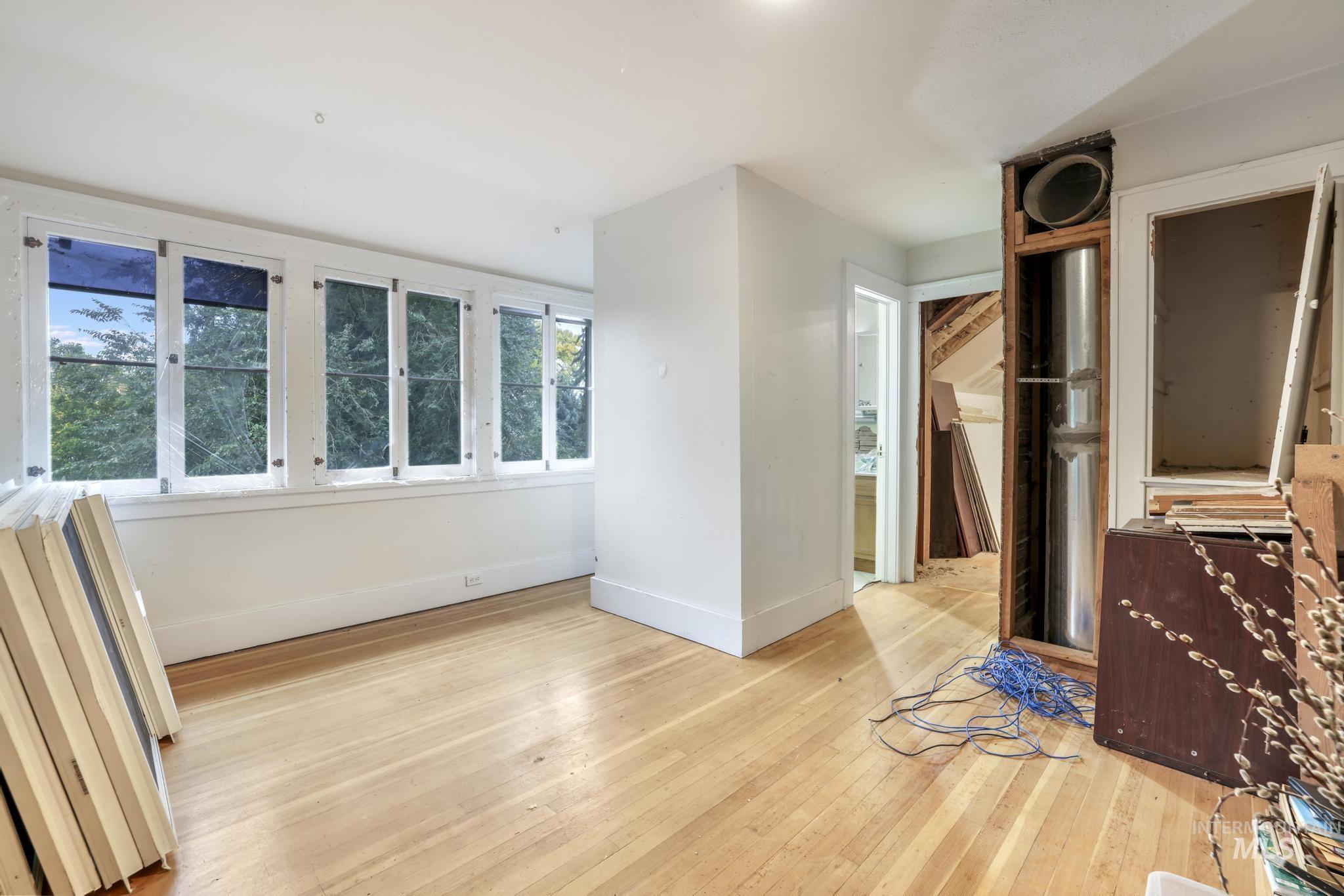Unfinished landing area of the upstairs.