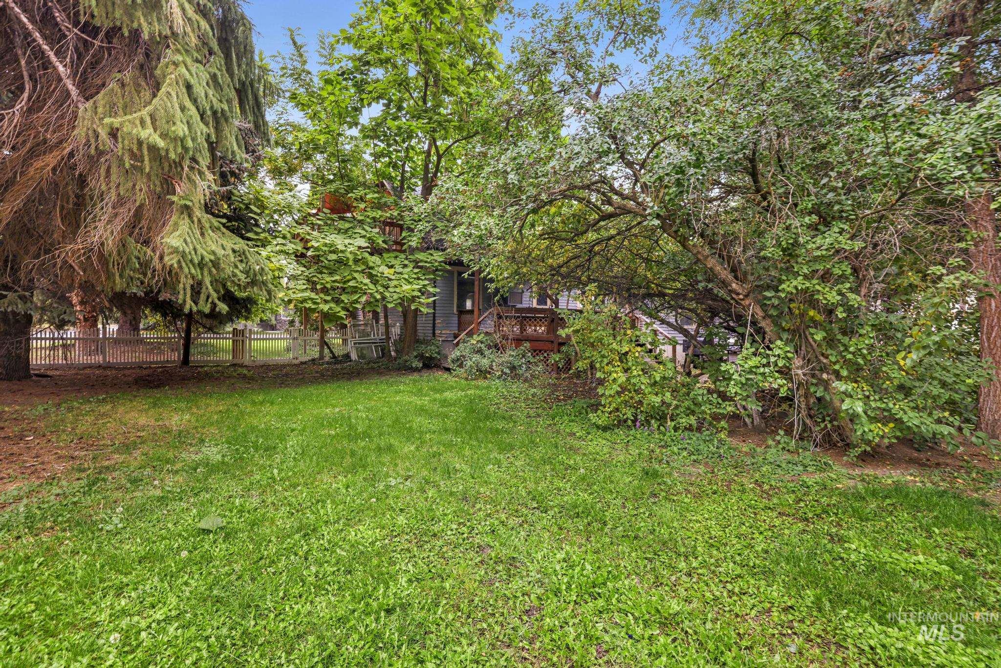 View of yard with a deck