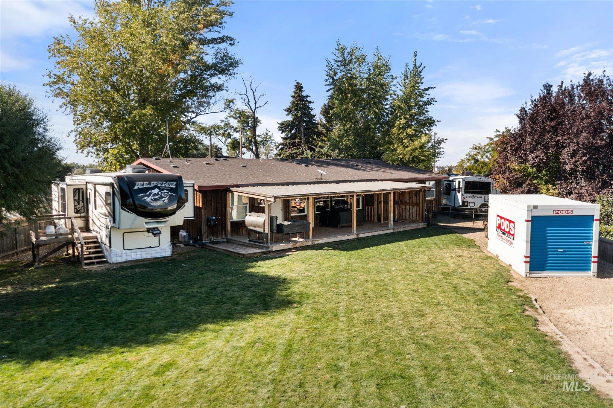 Back of property with a patio area