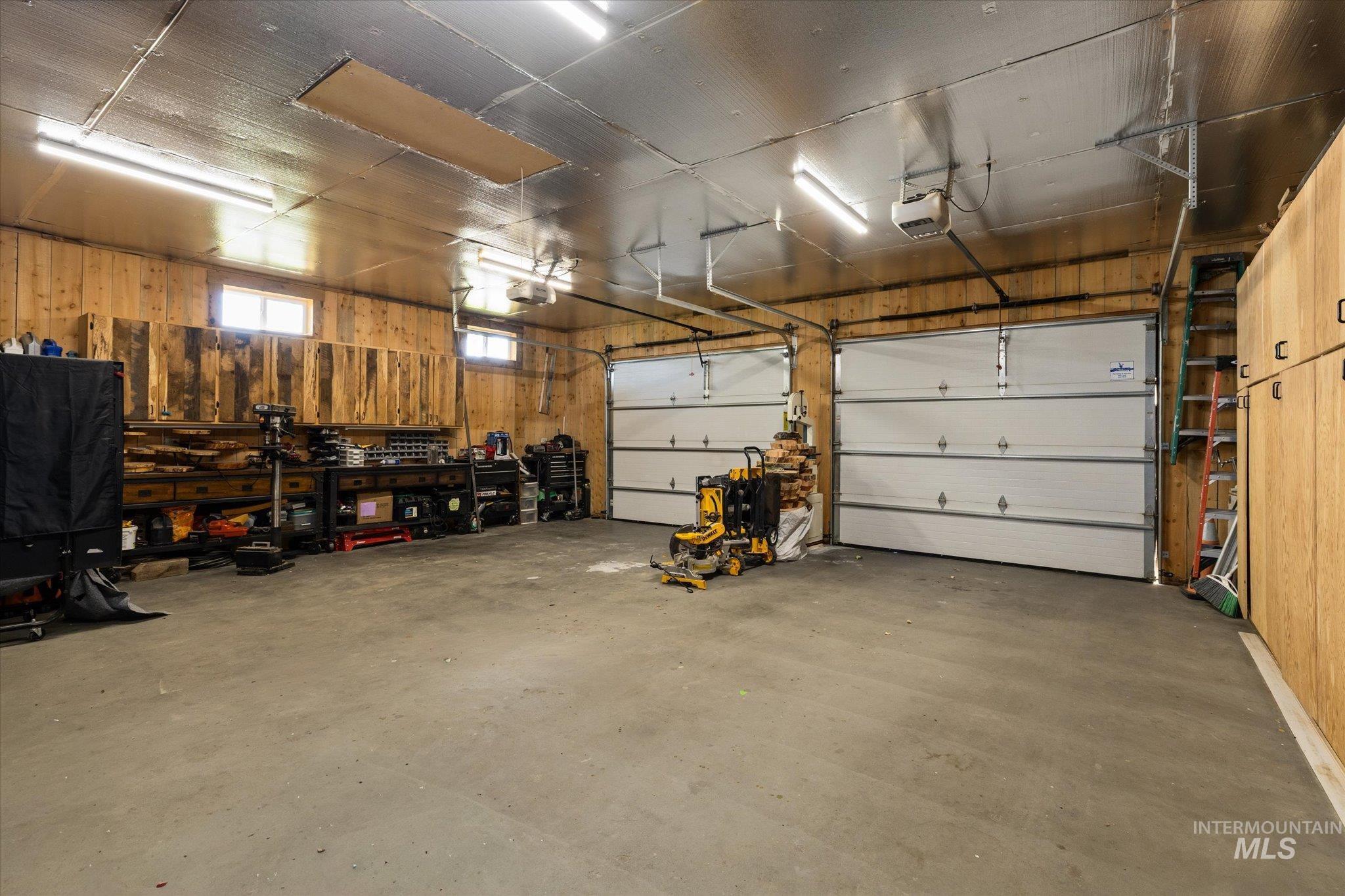 Garage featuring a garage door opener