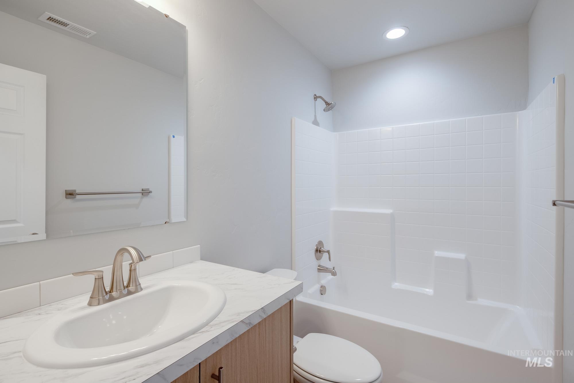 Full bathroom with  shower combination and vanity