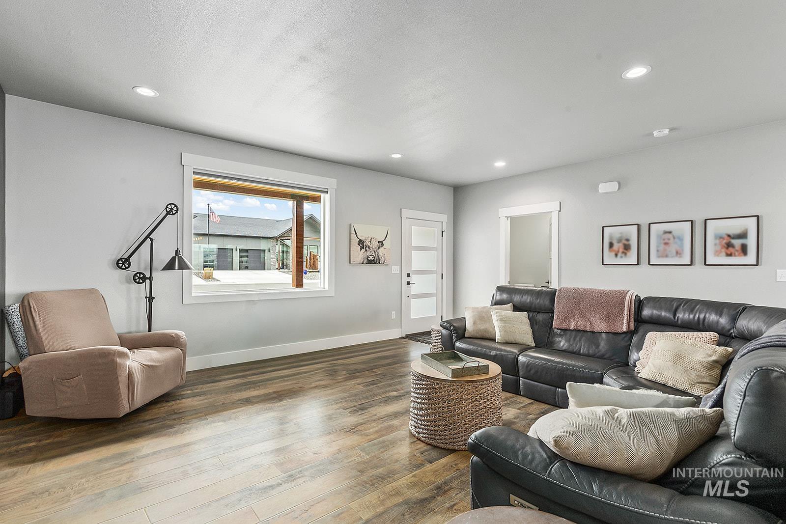 Living room featuring recessed lighting and wood finished floors