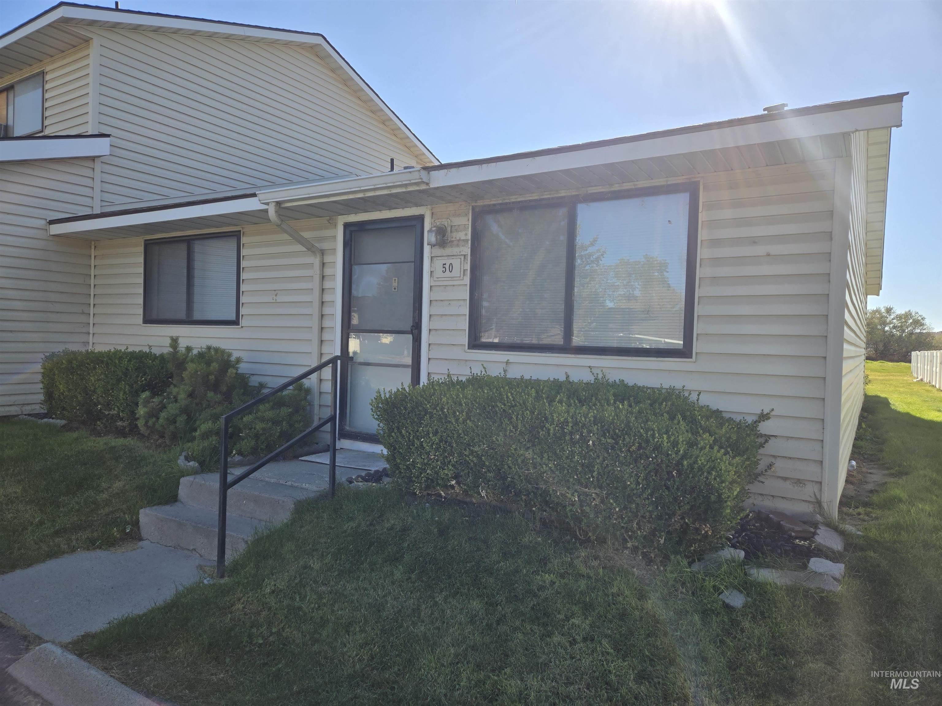 View of front of house with a front lawn
