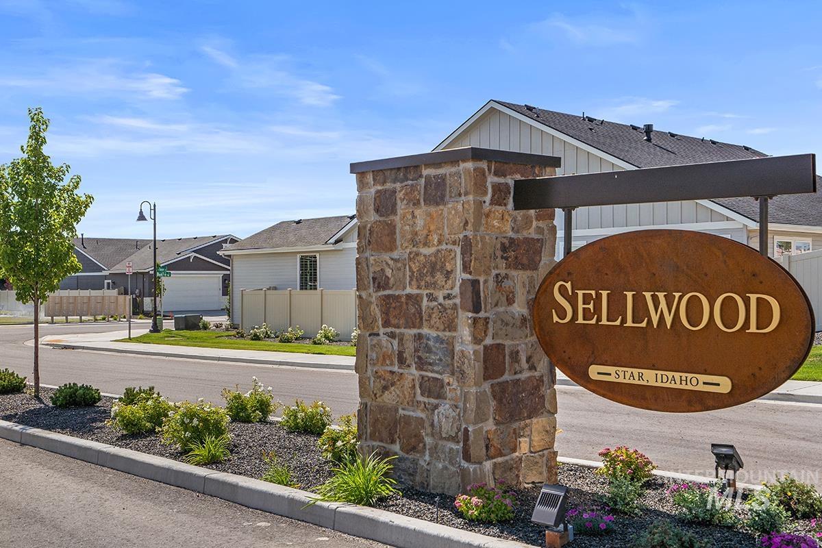 Community / neighborhood sign with a residential view