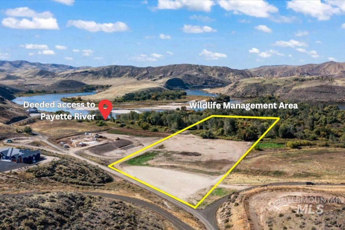View of property location with property boundaries highlighted and a water and mountain view