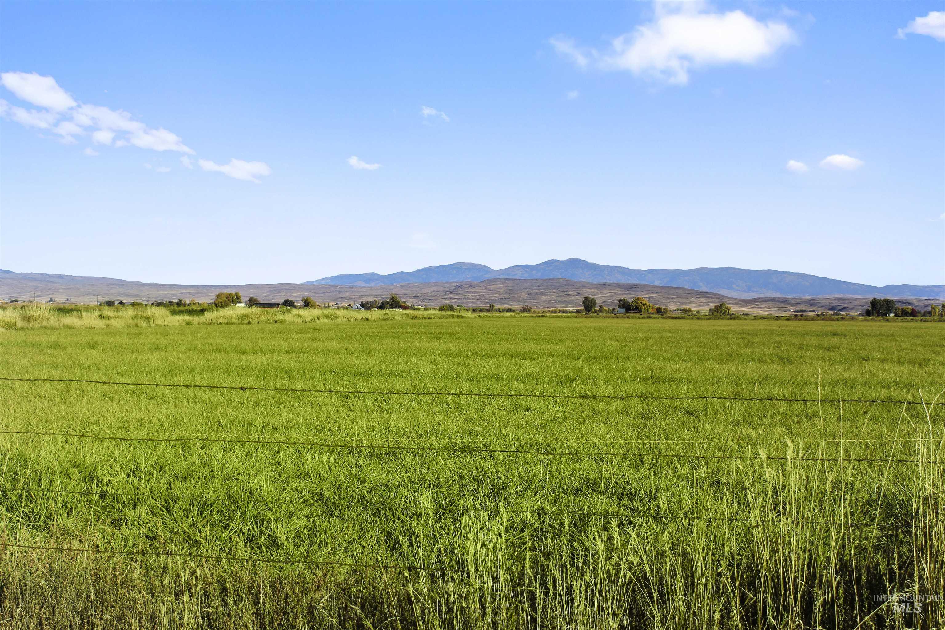 View of mountain background with rural landscape and a pastoral area