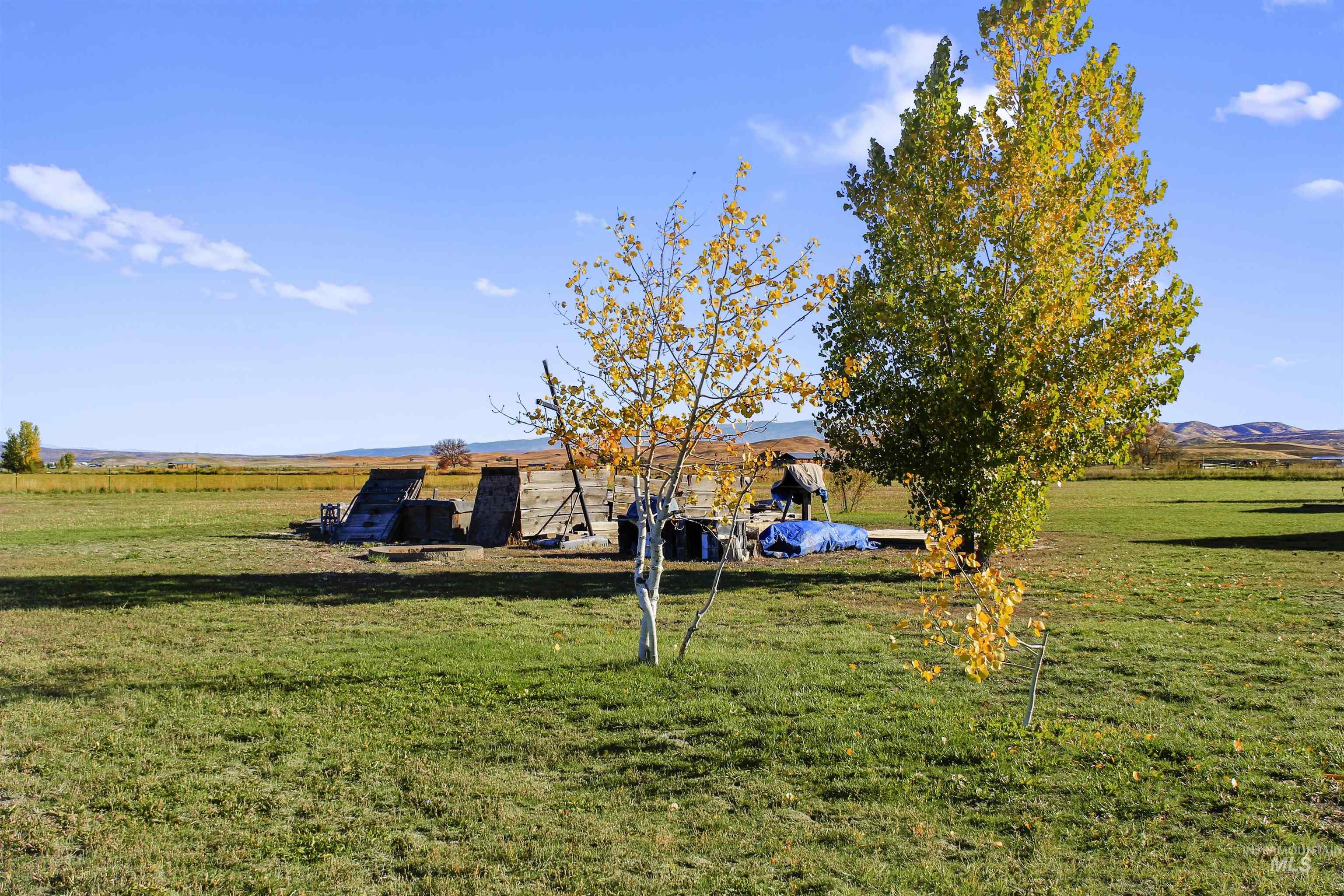 View of grassy yard featuring a rural view