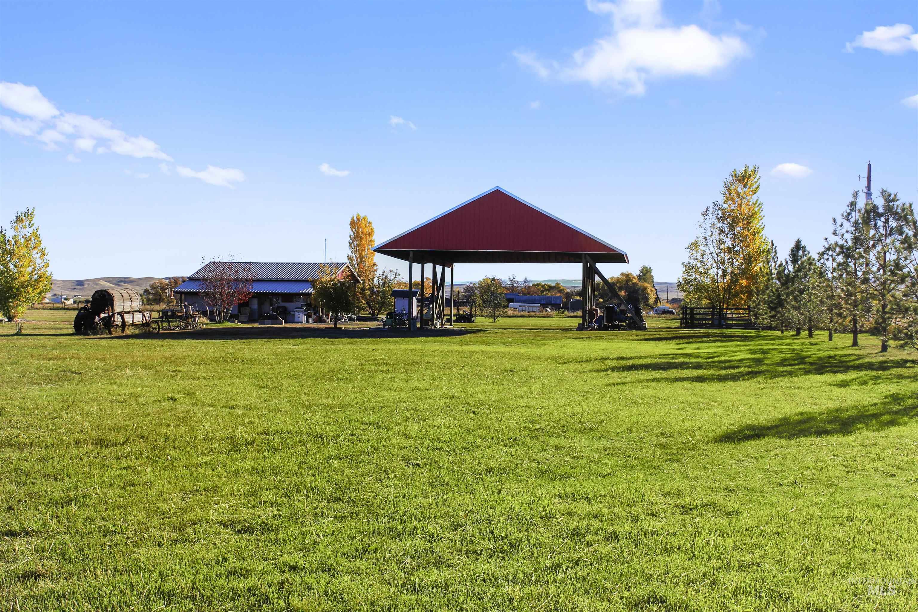 Surrounding community with a lawn and a view of countryside
