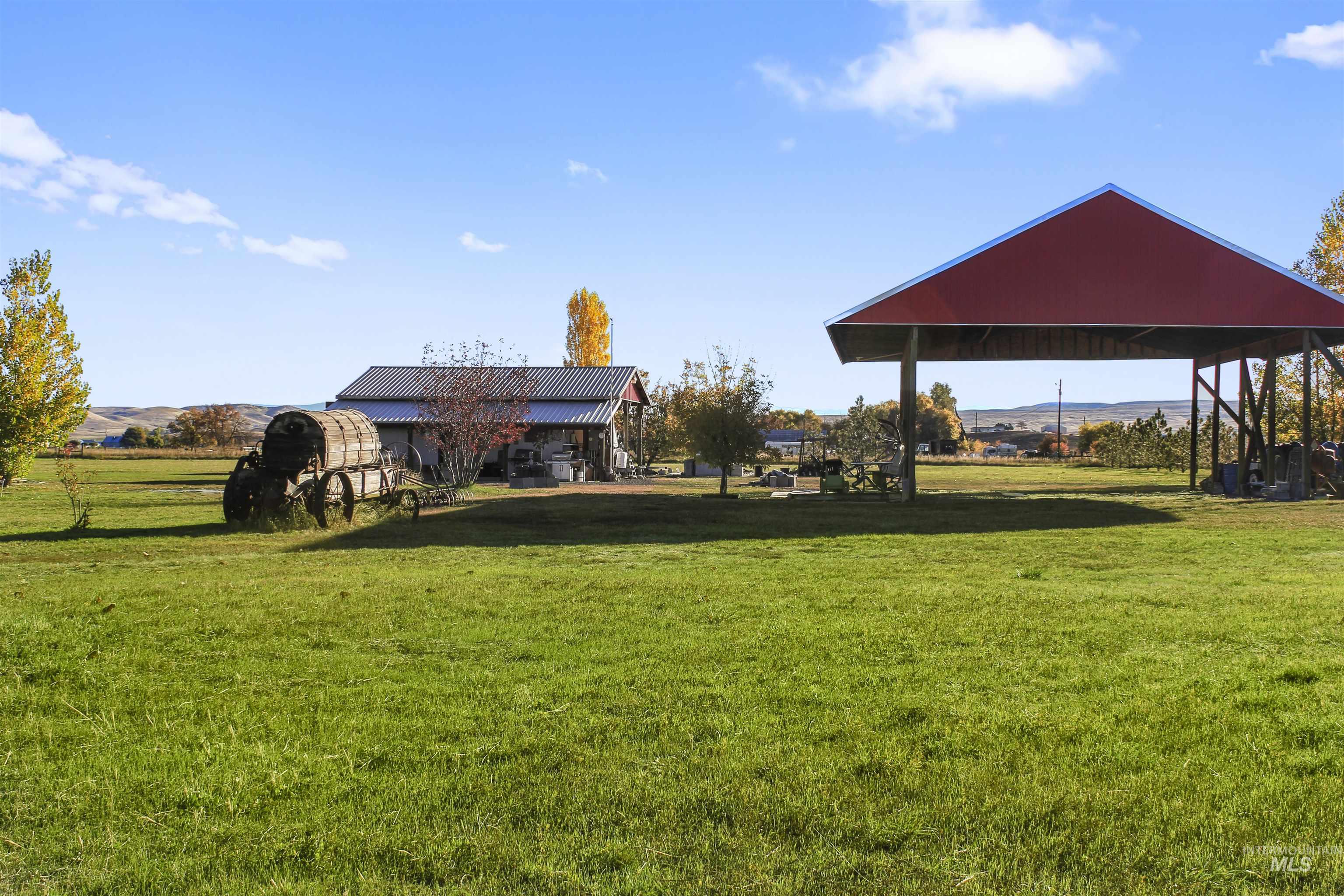 View of green lawn featuring a view of countryside and a mountain view