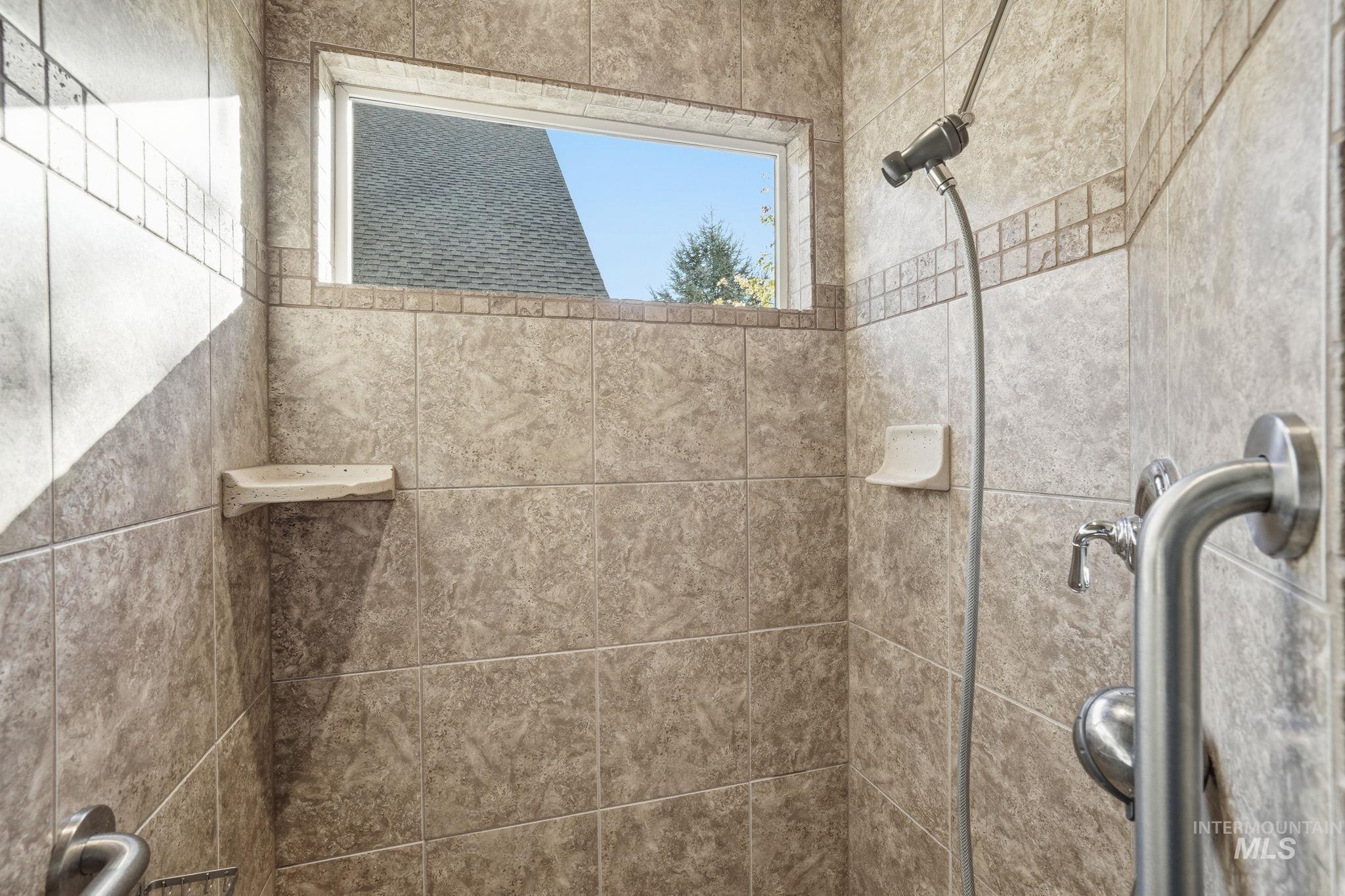 Bathroom with a tile shower