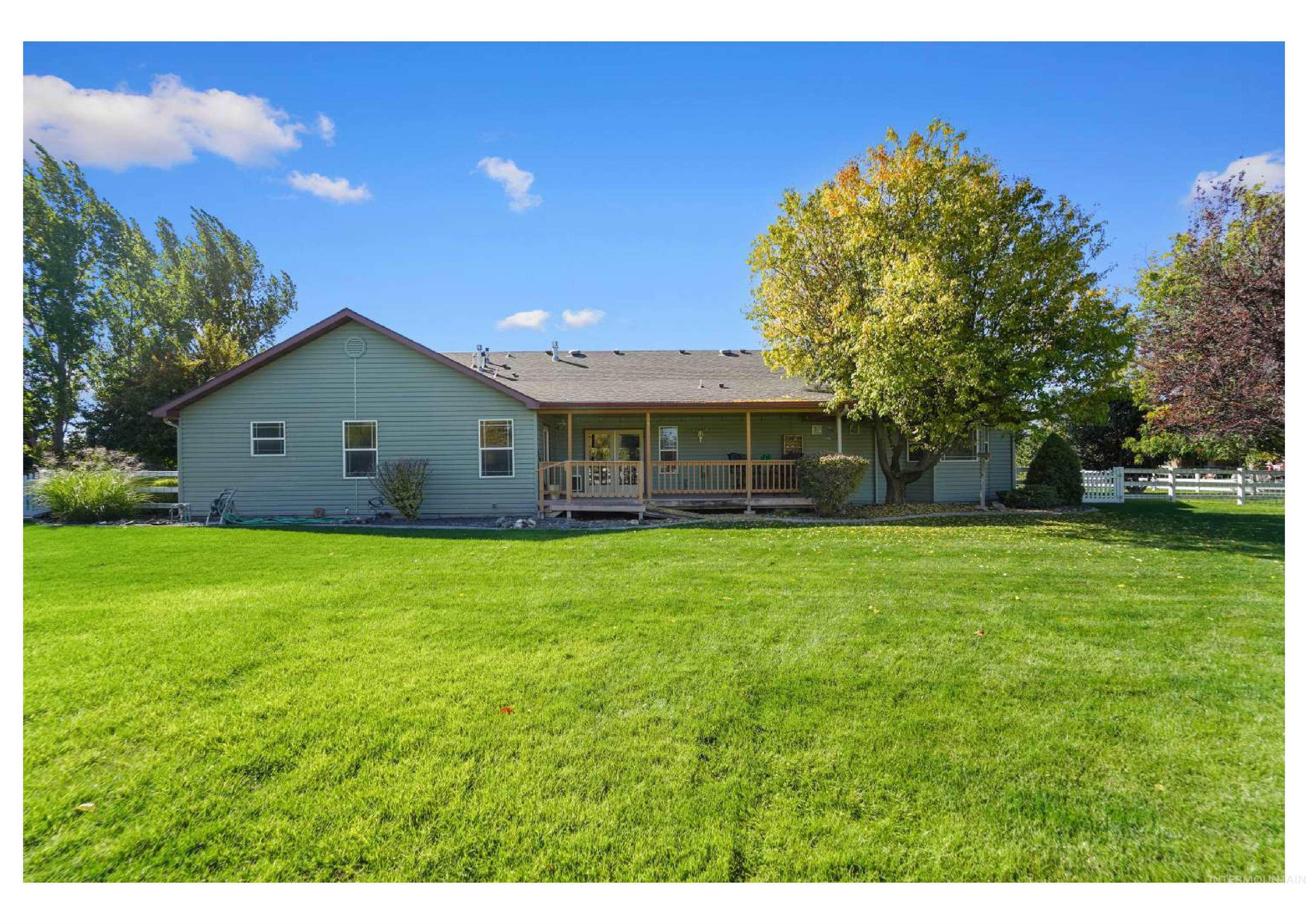 Rear view of property with a porch