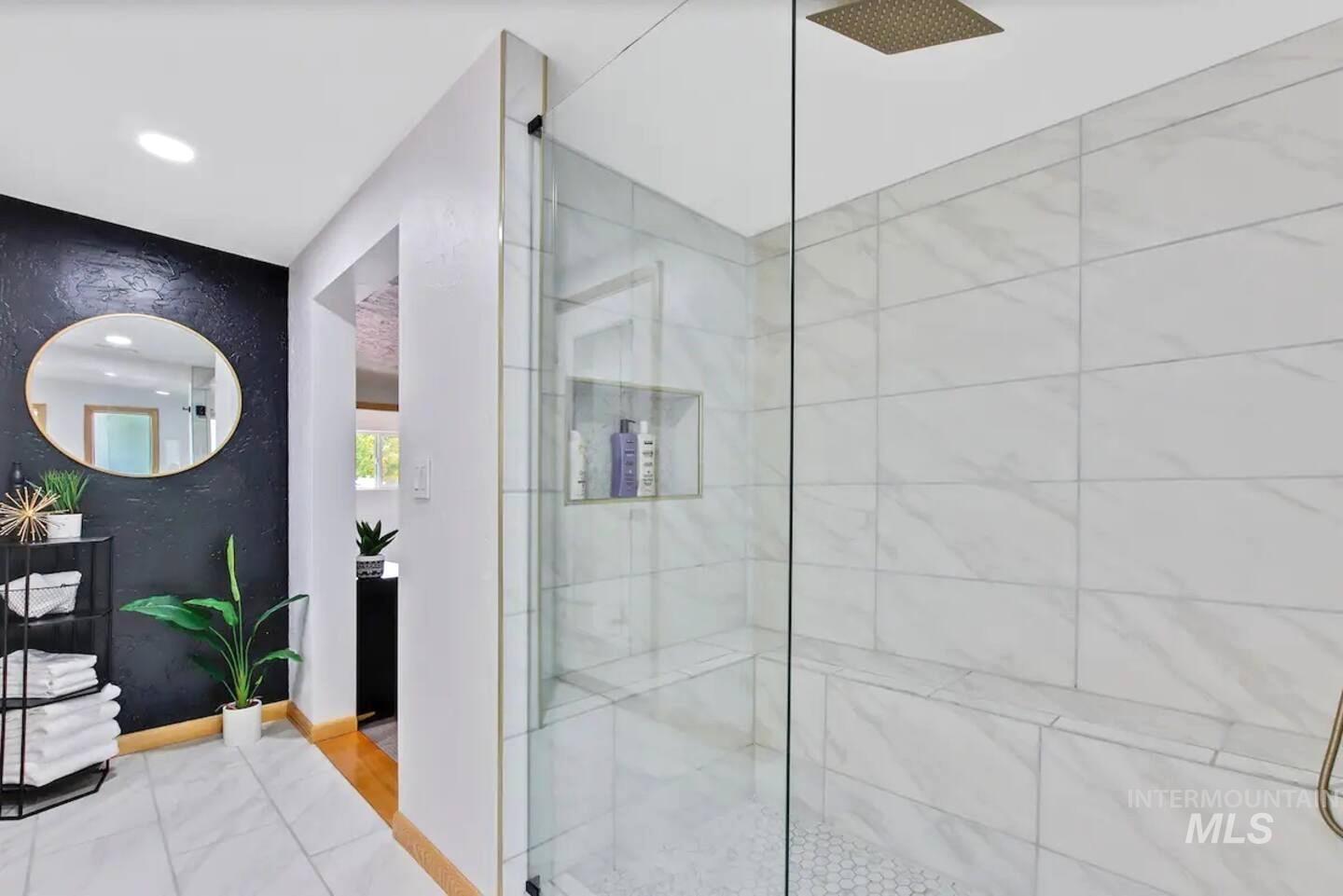 Bathroom featuring a walk in shower and recessed lighting