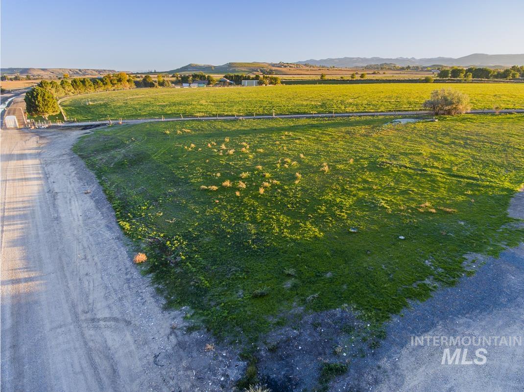 View of yard featuring a view of rural / pastoral area and a mountain view