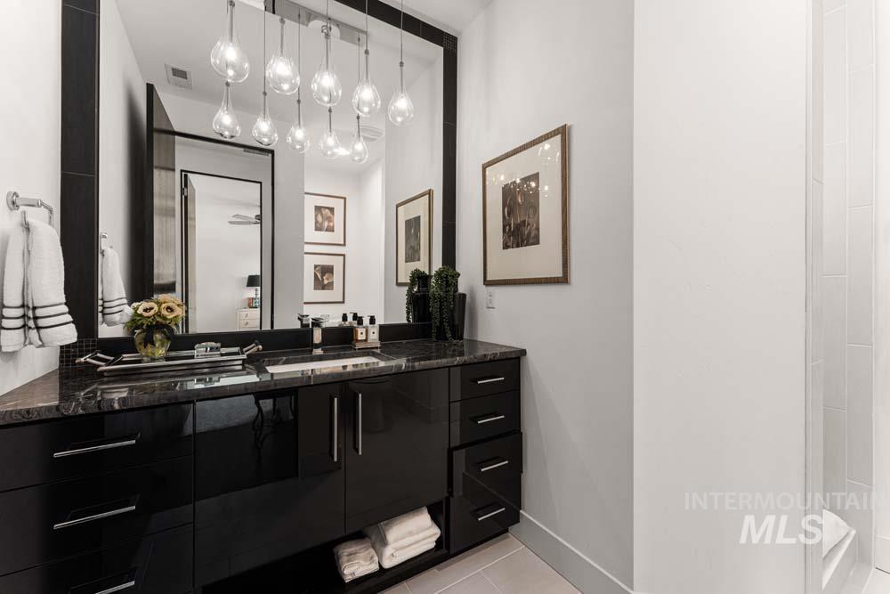 Bathroom with vanity and tile patterned floors