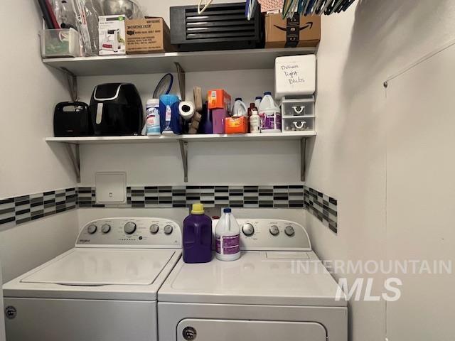 Laundry area with separate washer and dryer