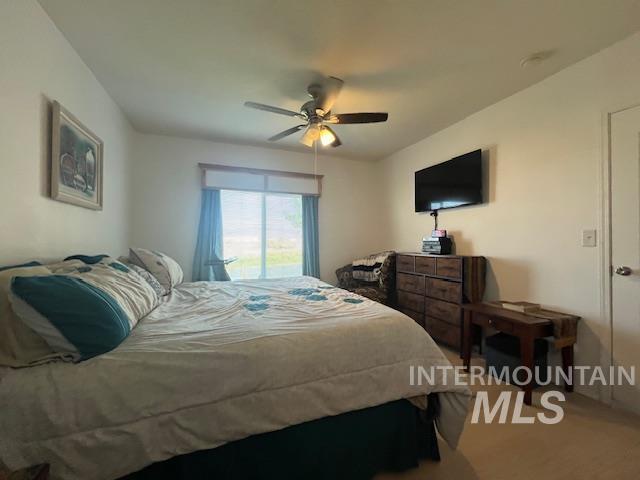 Bedroom with a ceiling fan