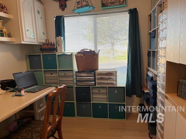 Office featuring light wood-style floors