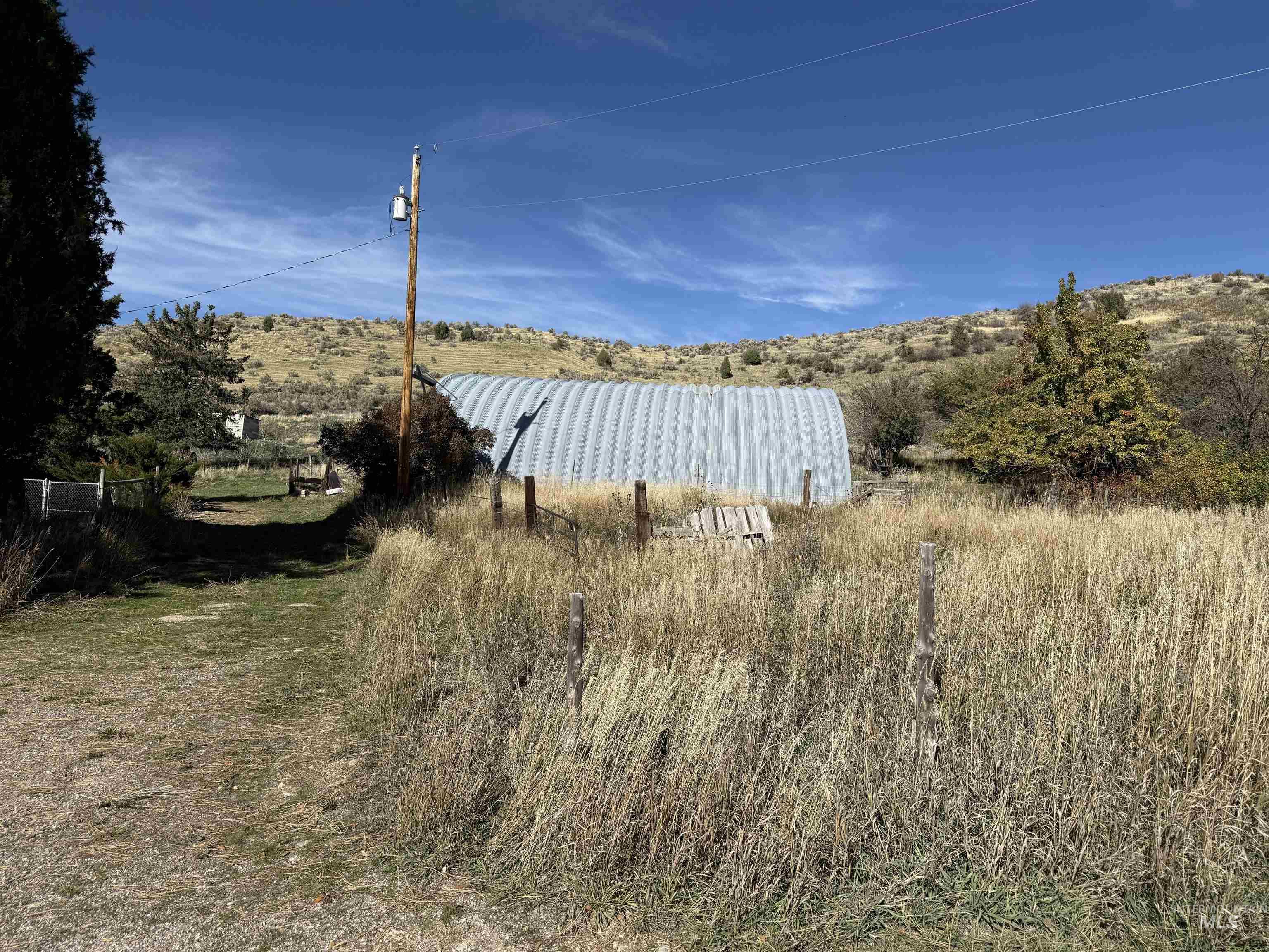 View of yard with a view of rural / pastoral area and a mountain view