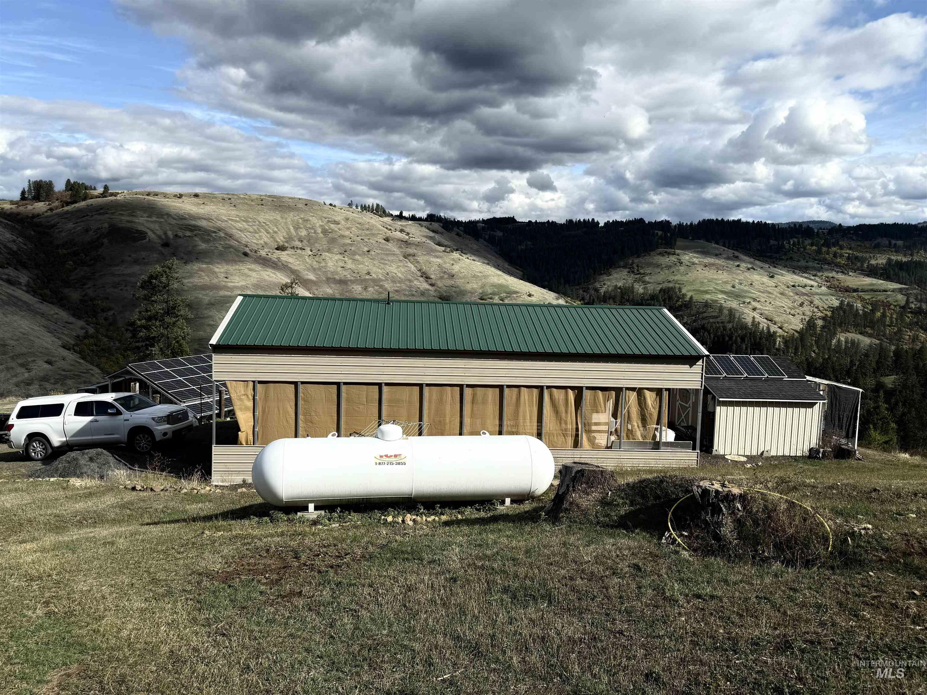 View of outdoor structure featuring a mountain view
