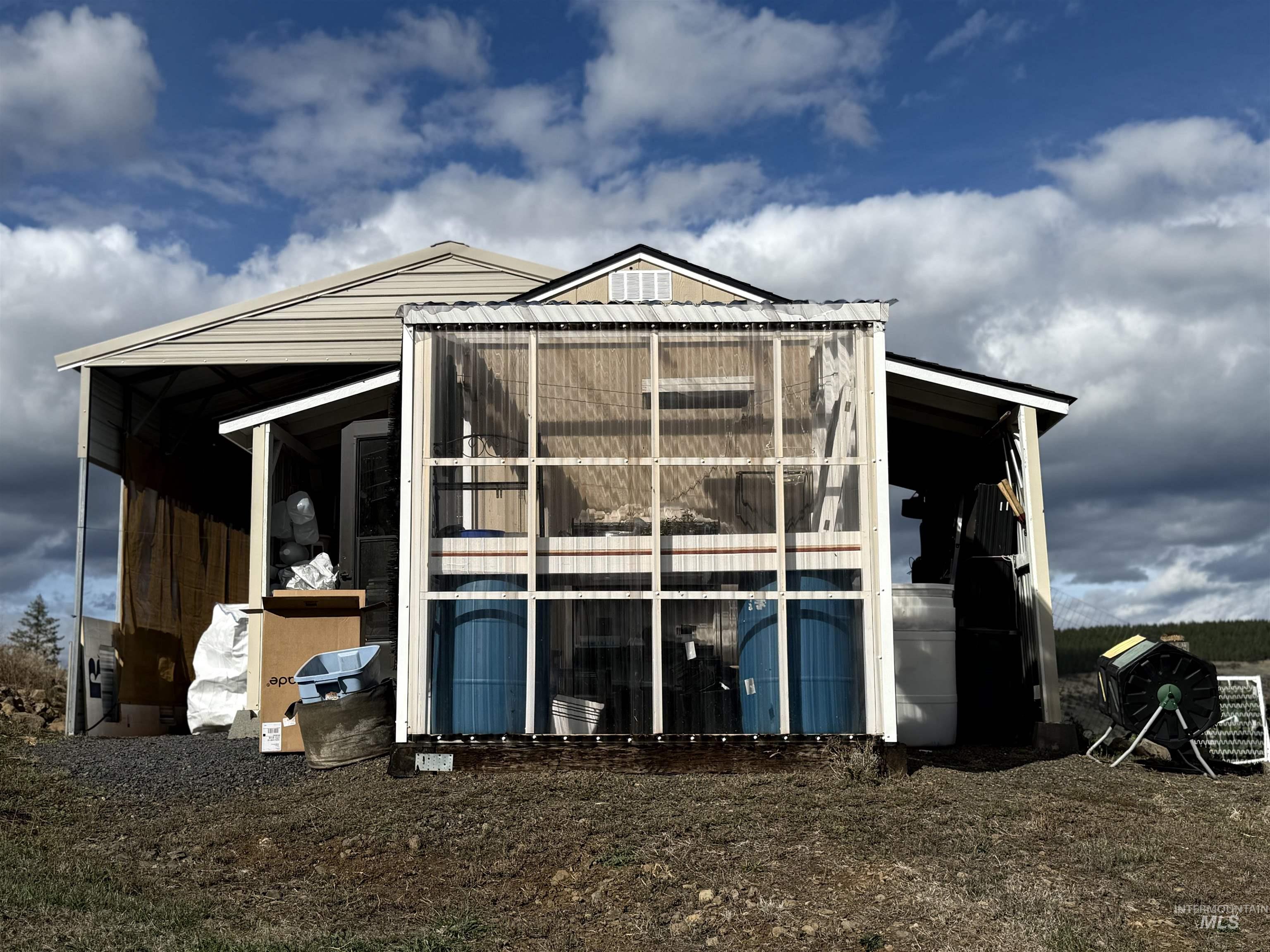 Located off the back of the storage shed