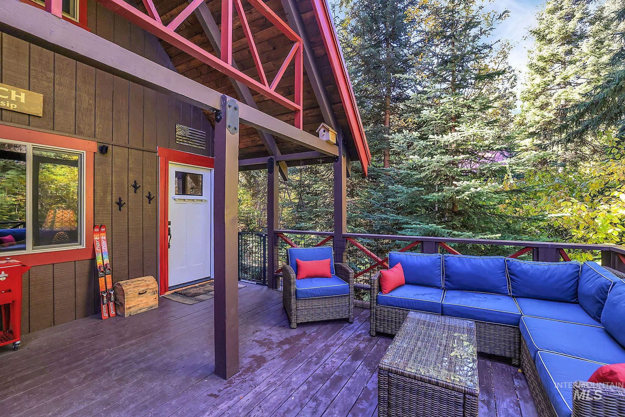Wooden terrace with outdoor lounge area