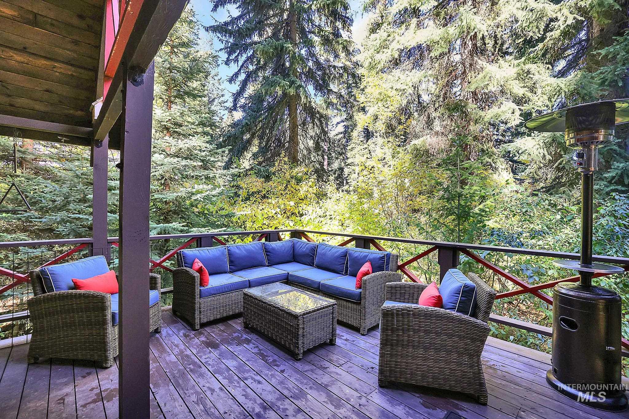 Wooden terrace featuring outdoor lounge area