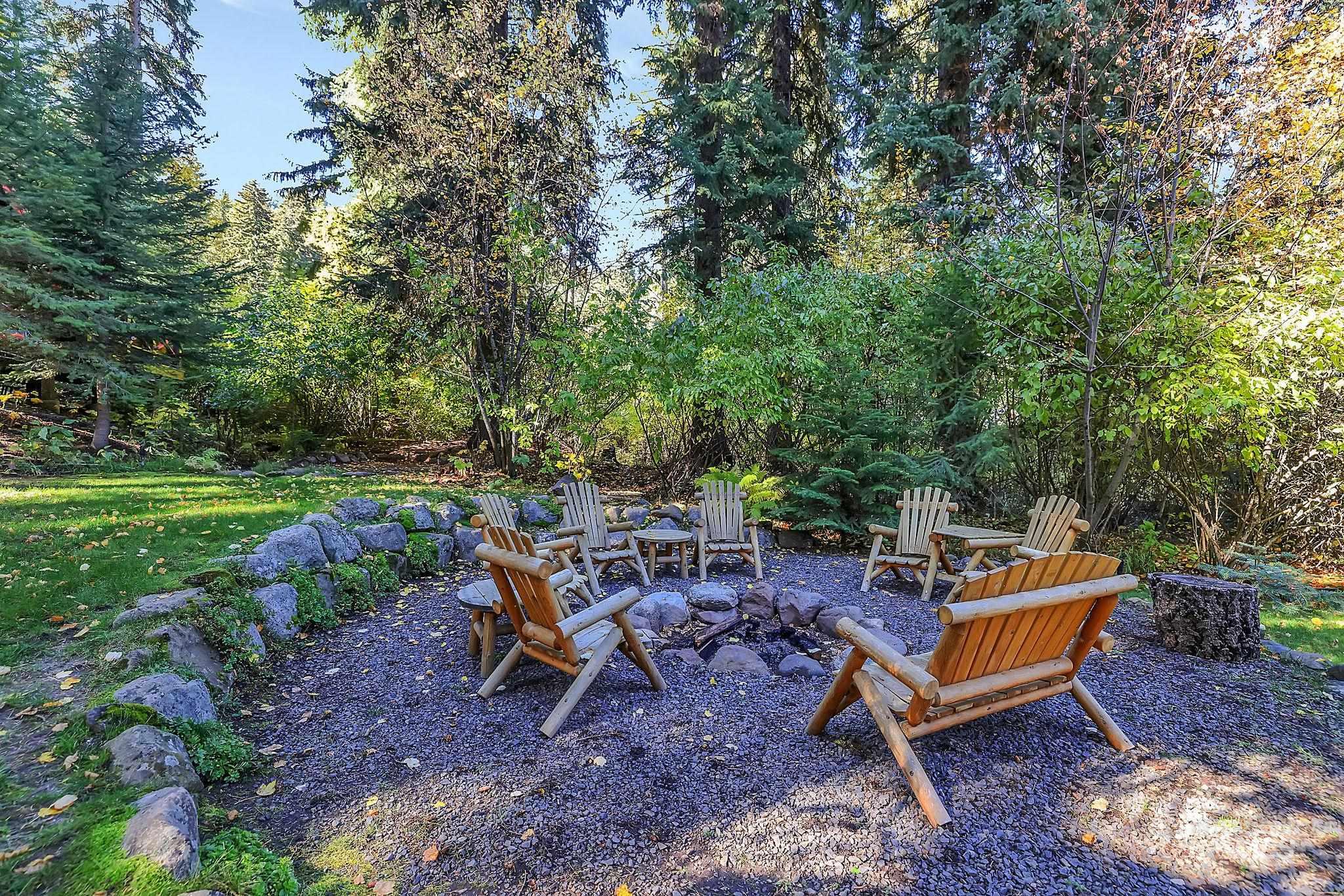 View of patio featuring an outdoor fire pit