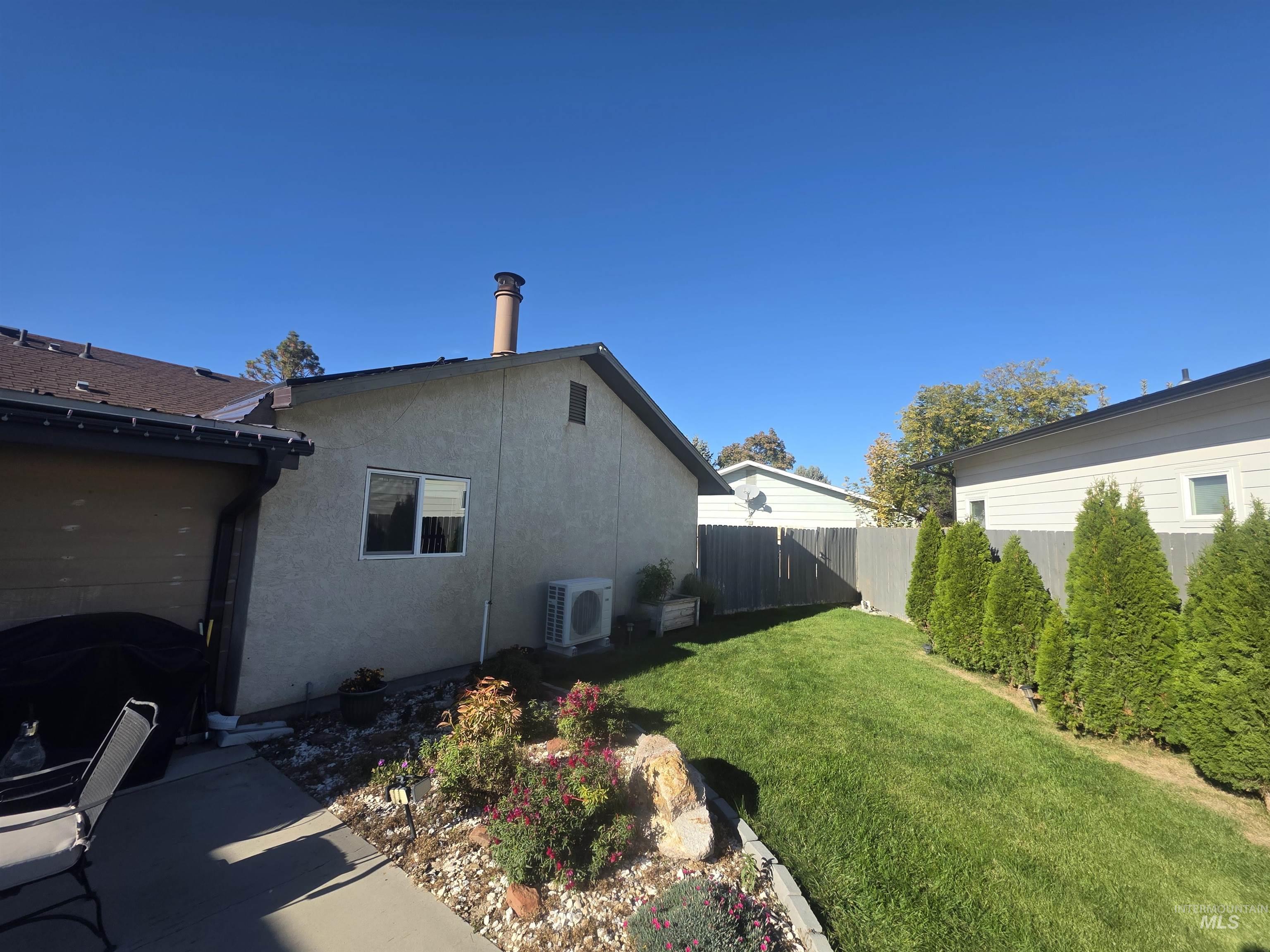 Back of house and portion of patio