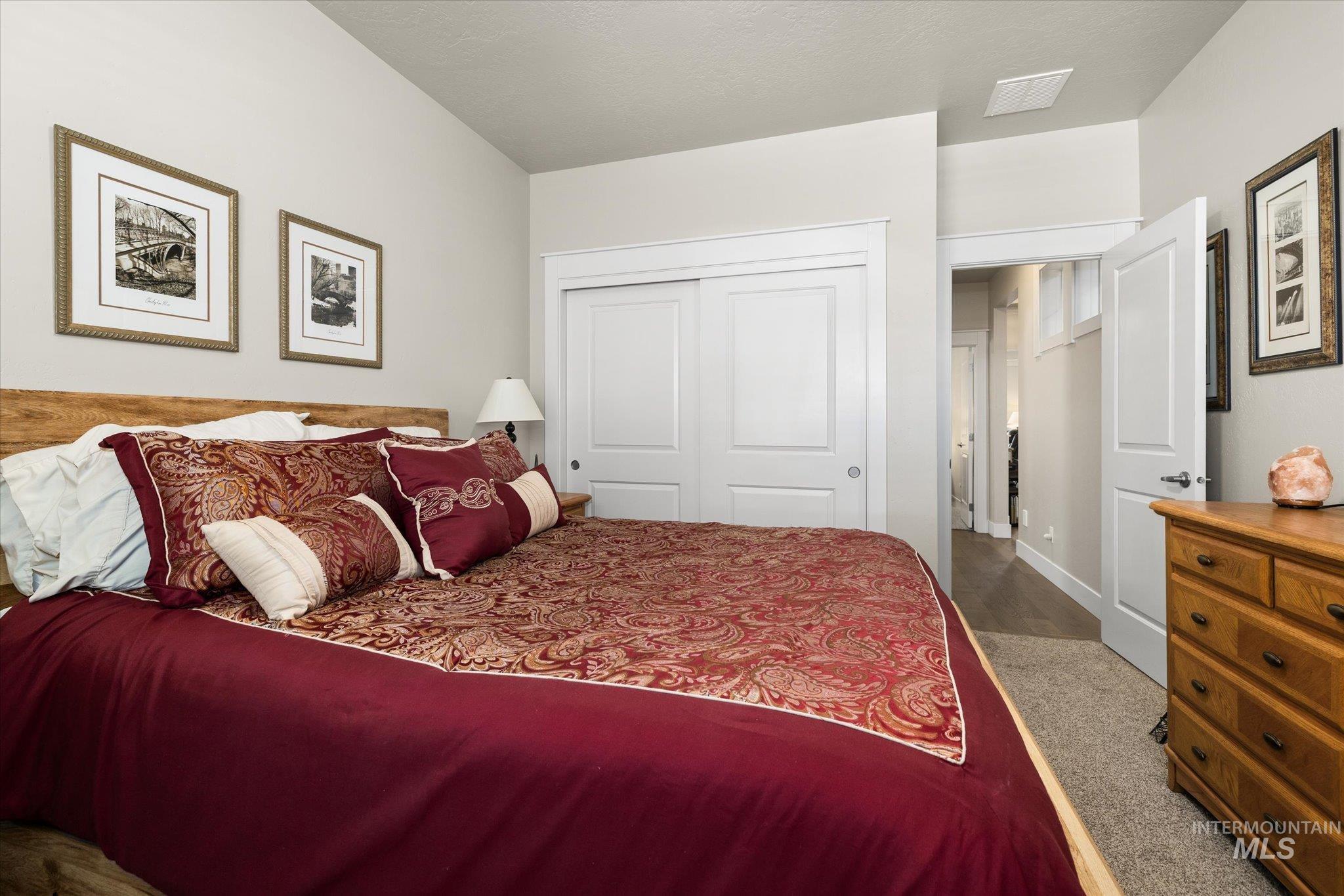 Bedroom with a closet and baseboards