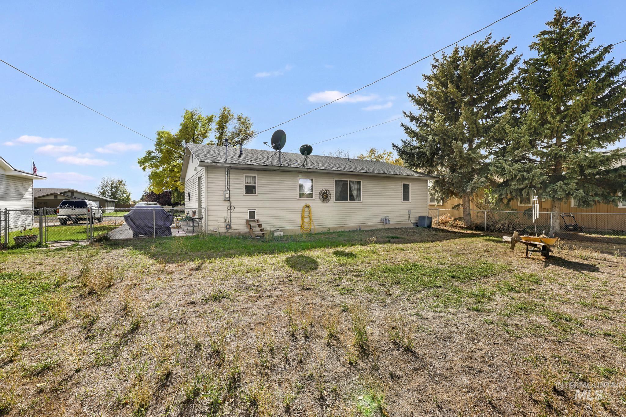 Back of house with a gate