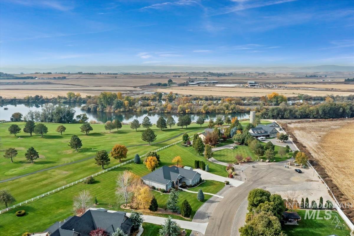 Aerial view of sparsely populated area with a nearby body of water