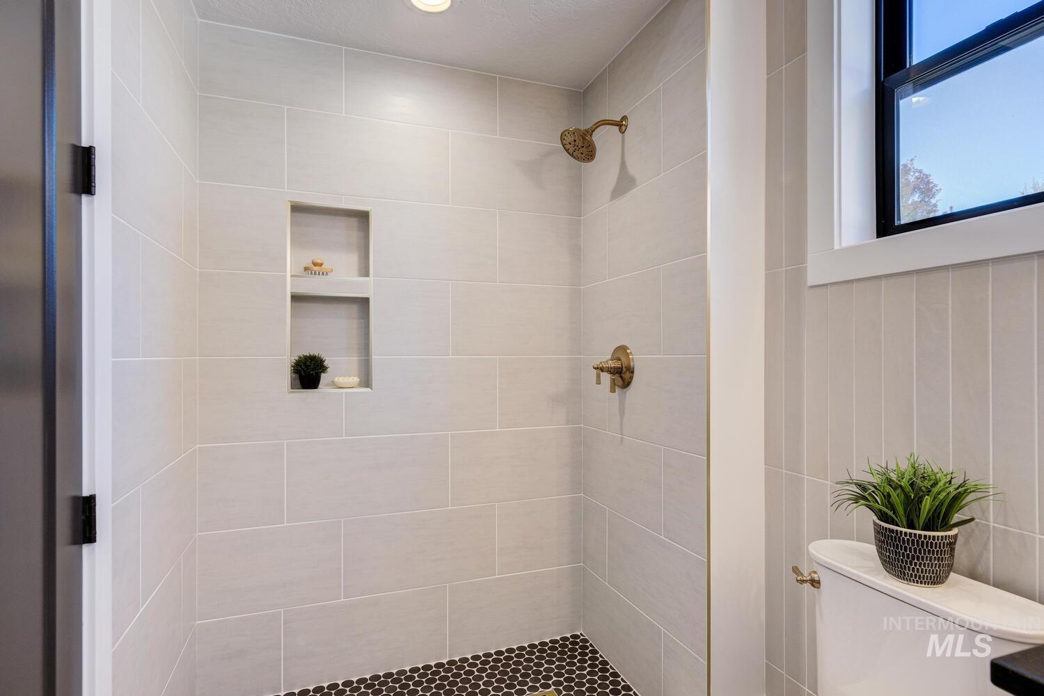 Bathroom with a shower stall