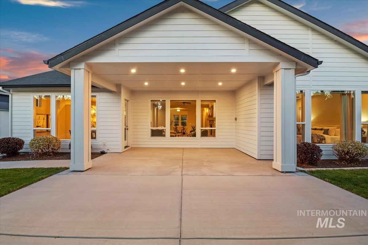 Rear view of house featuring a patio