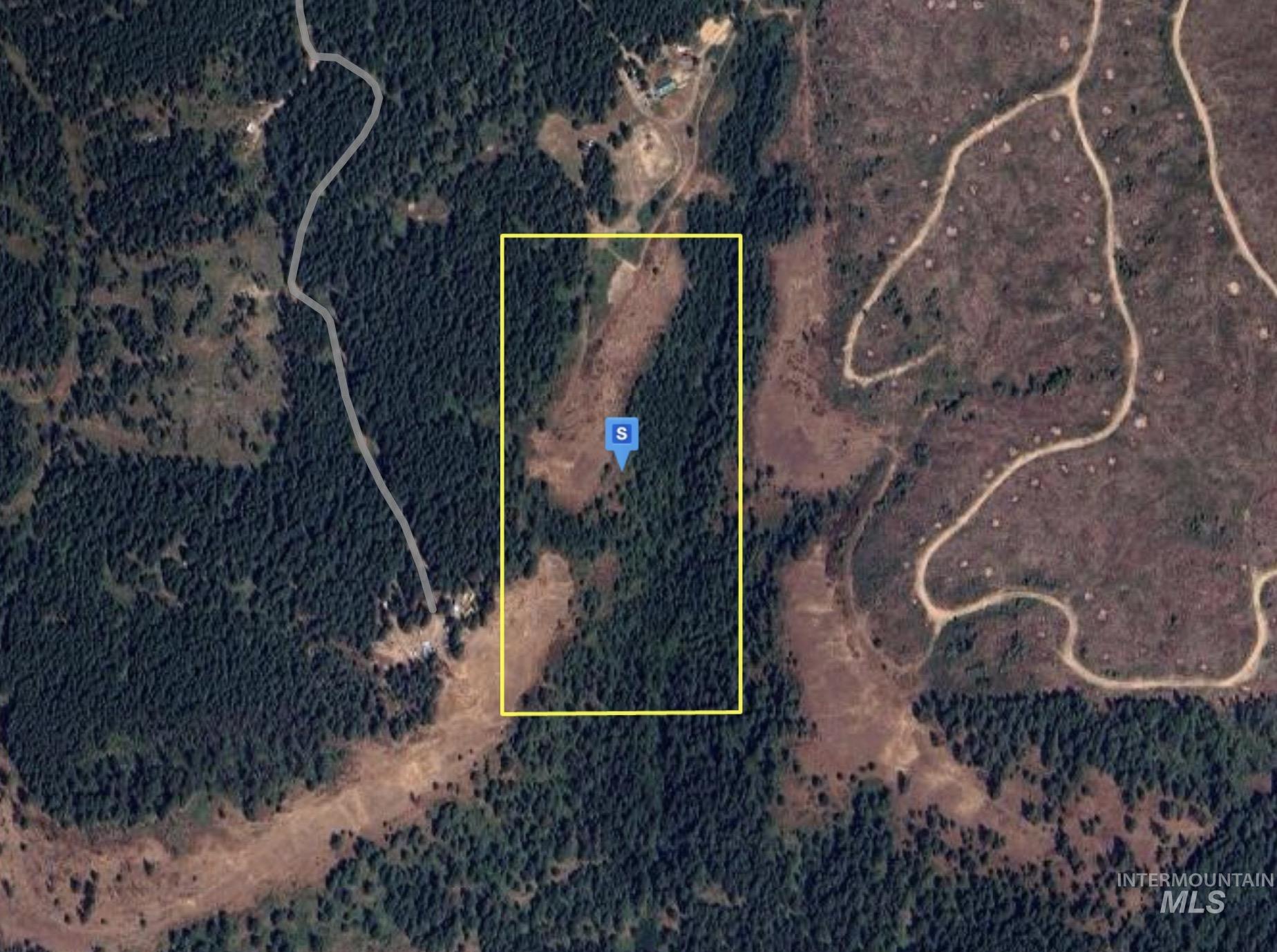 Aerial overview of property's location with property boundaries highlighted