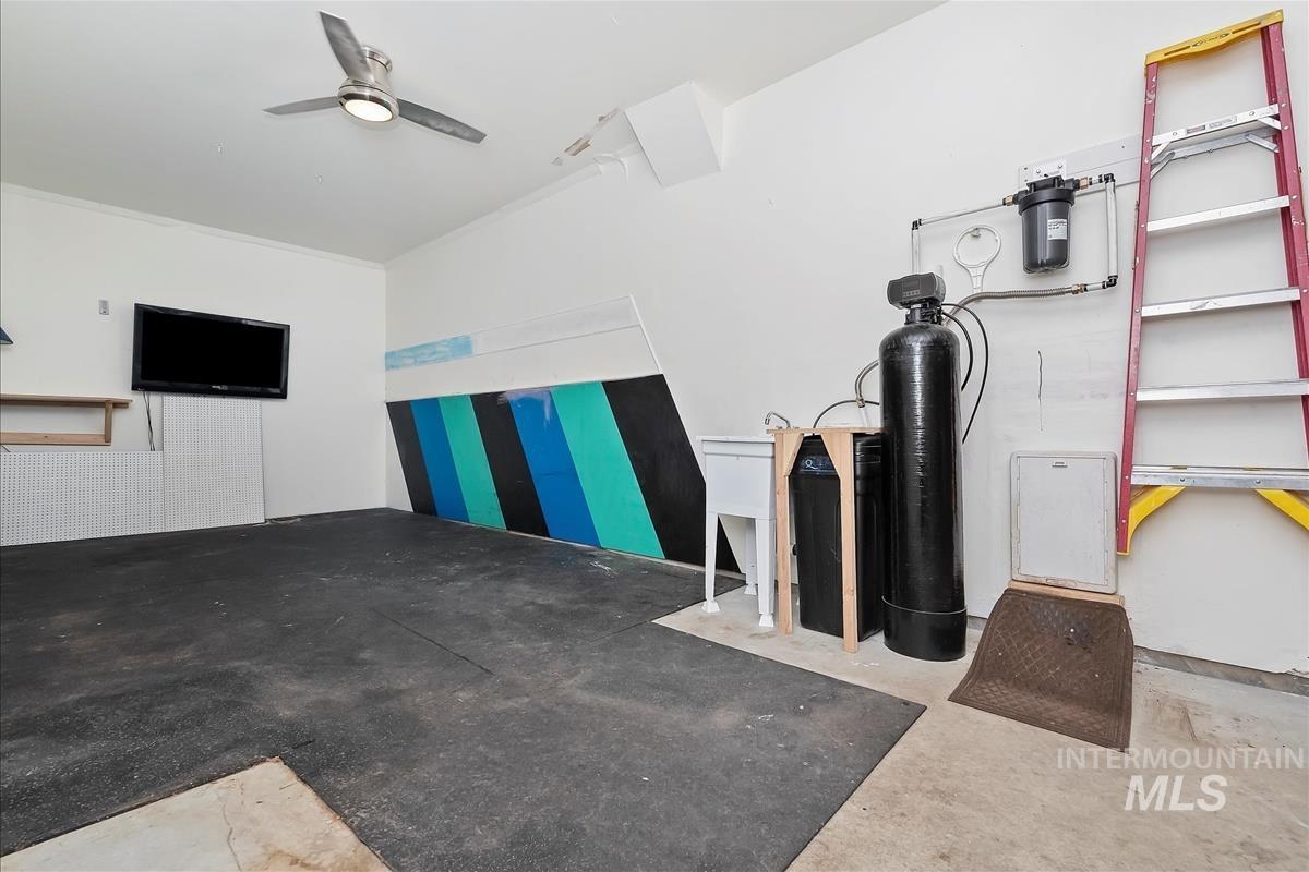 Garage featuring ceiling fan