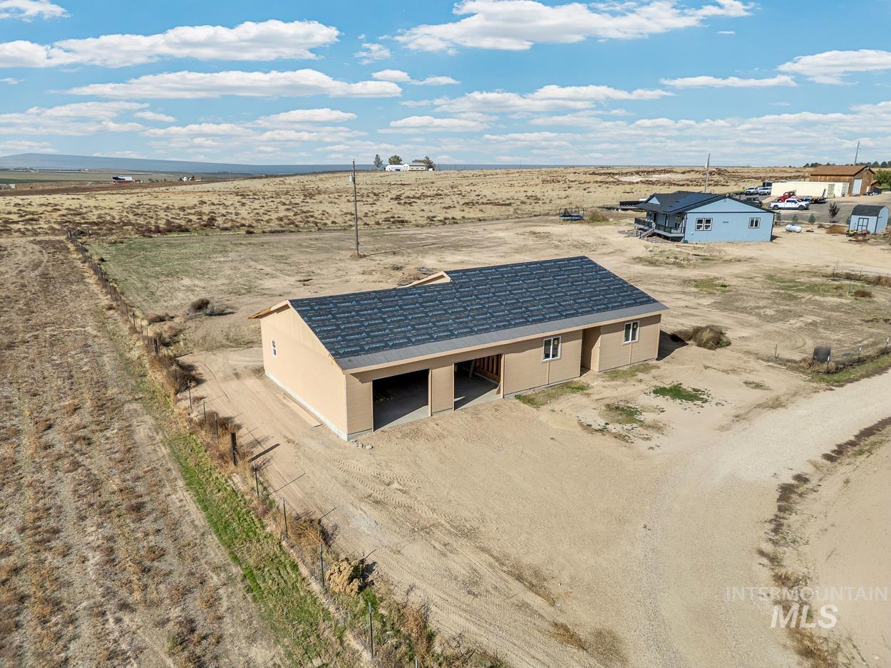 Aerial view of sparsely populated area featuring a desert landscape