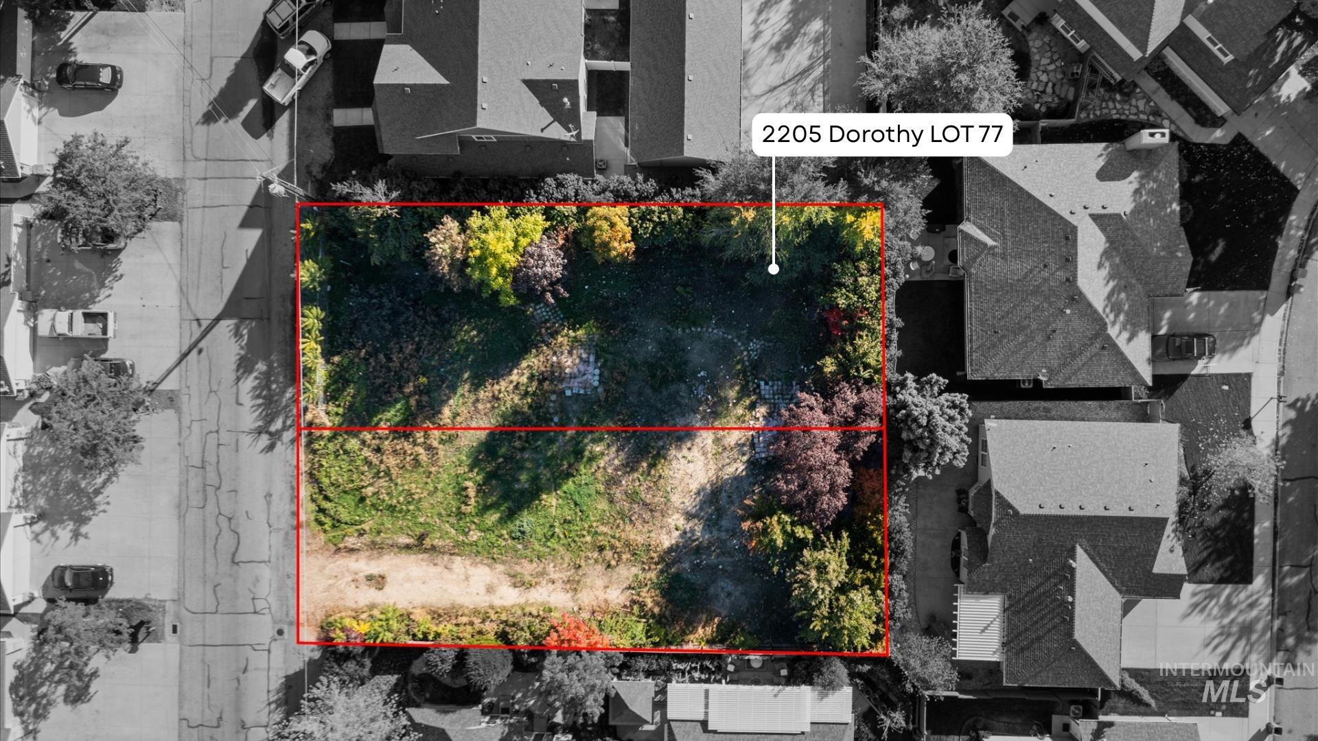 Aerial view of residential area featuring property parcel outlined