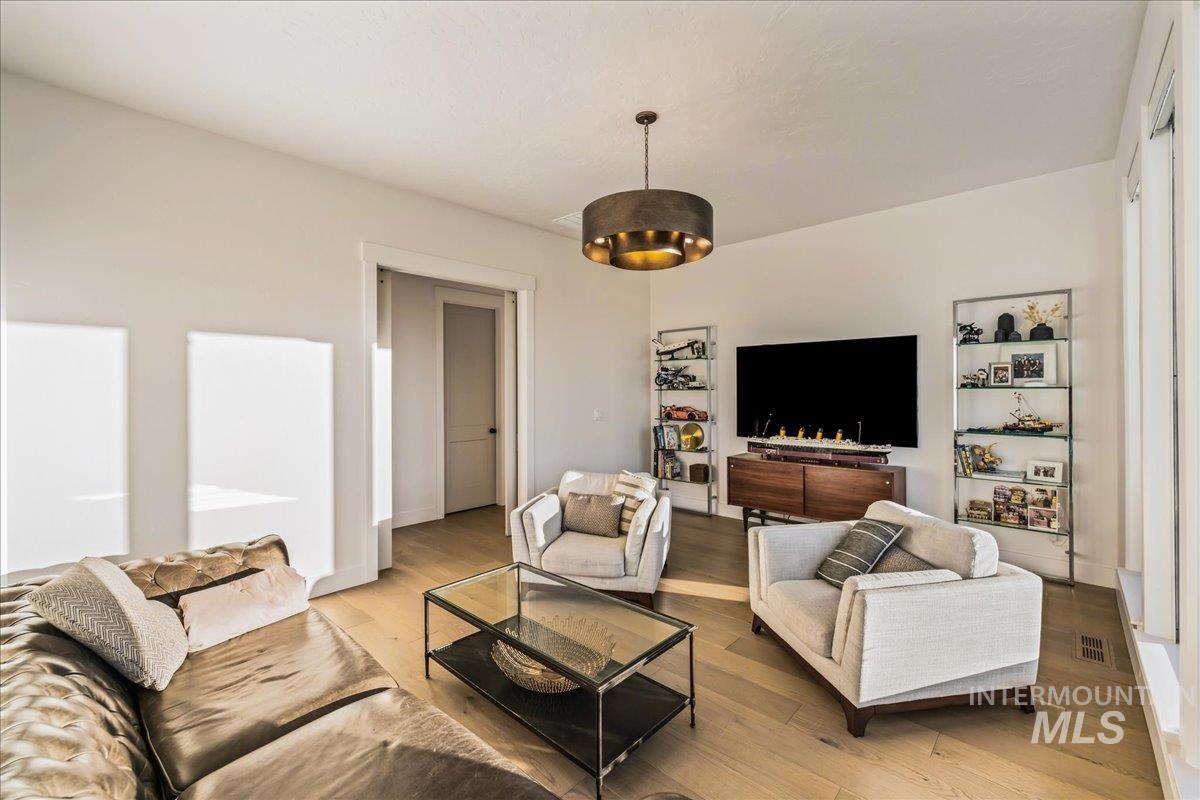Living area featuring wood finished floors