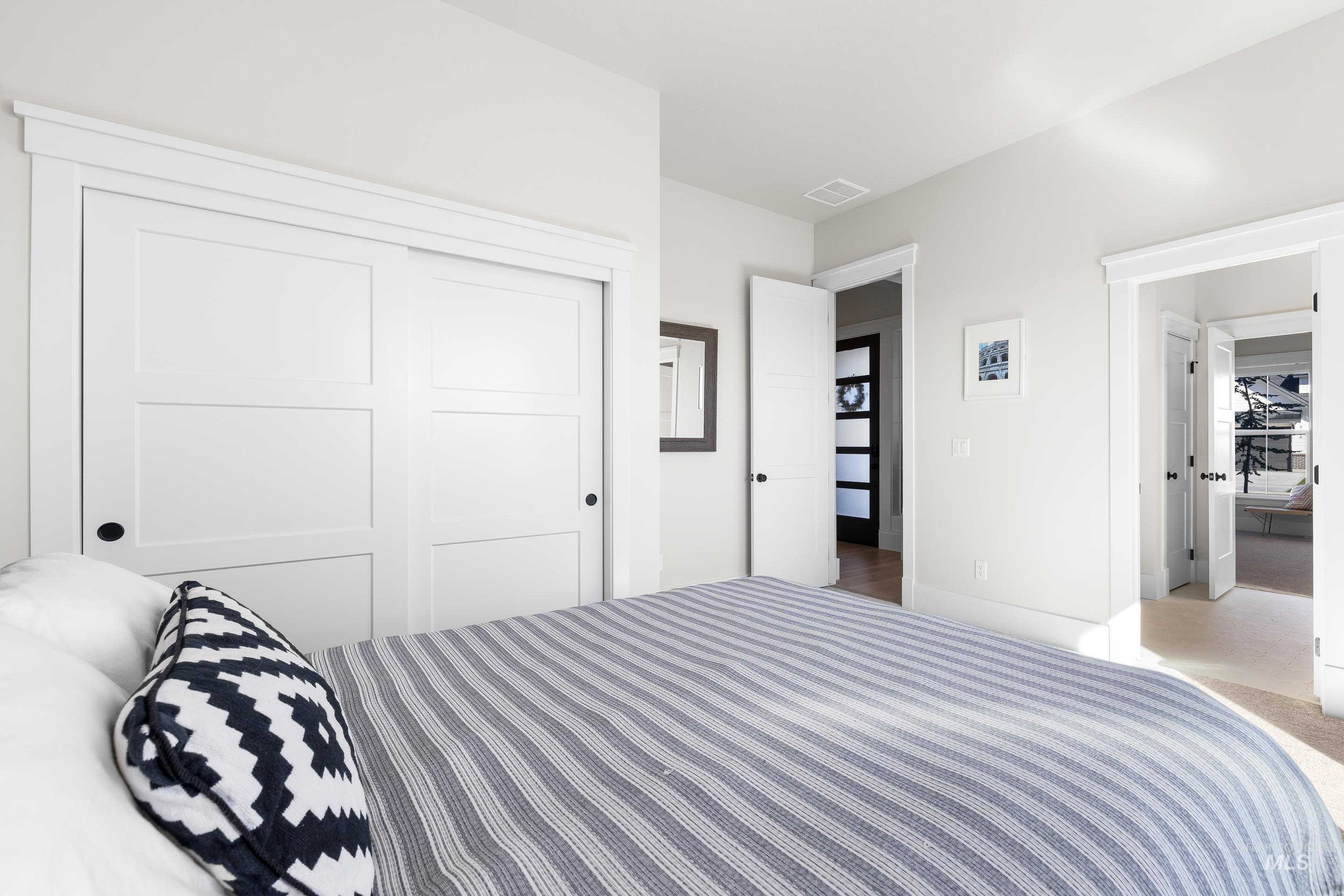 Bedroom featuring a closet and carpet floors