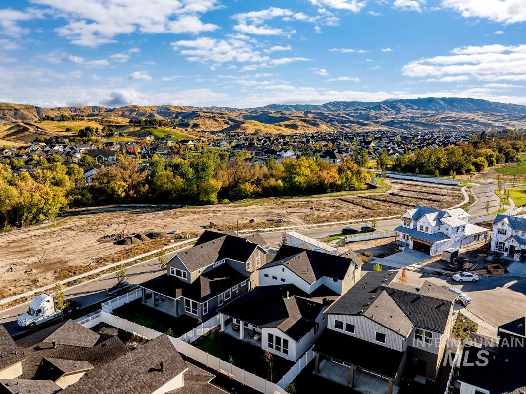 Aerial view of residential area with a mountainous background