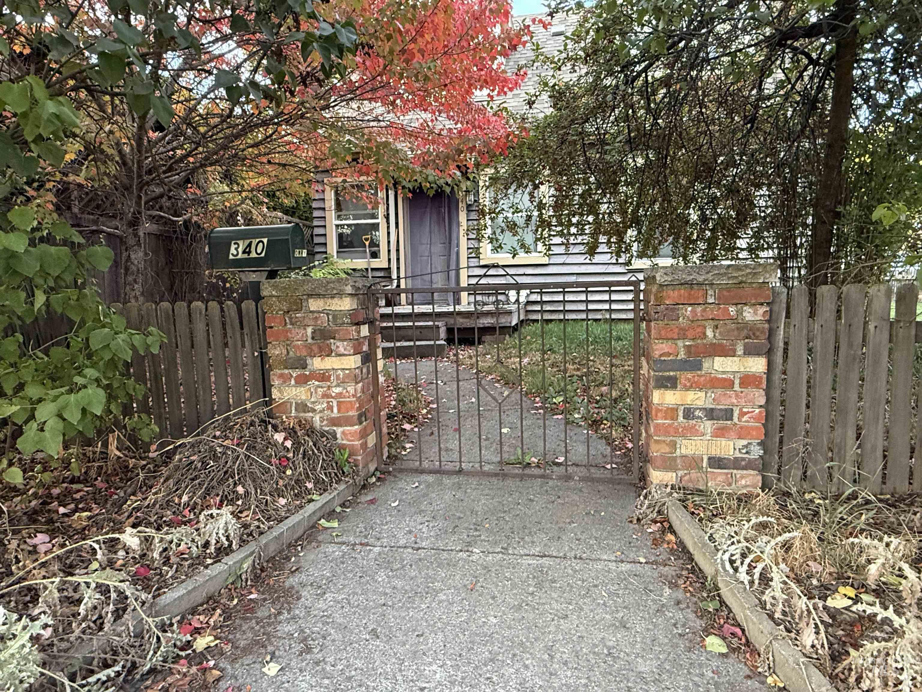 Gate with a fenced front yard