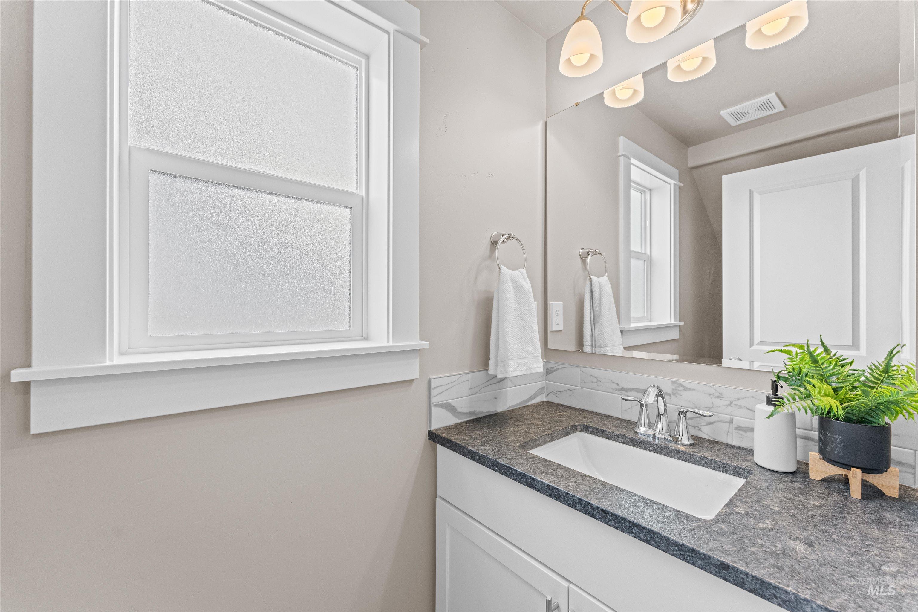 Bathroom featuring vanity