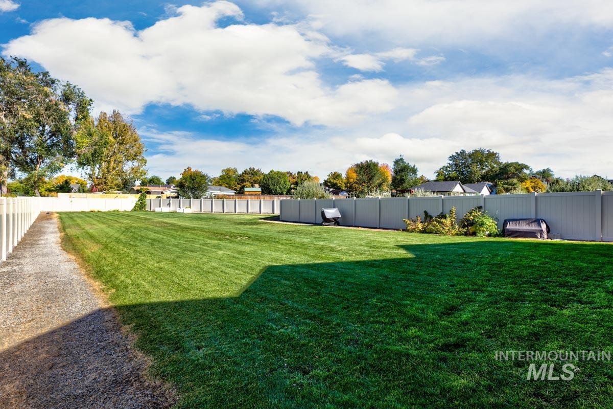 View of fenced backyard