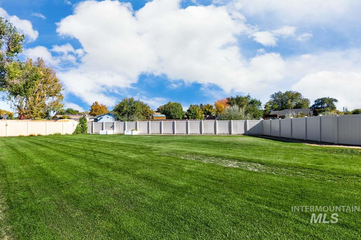 View of fenced backyard