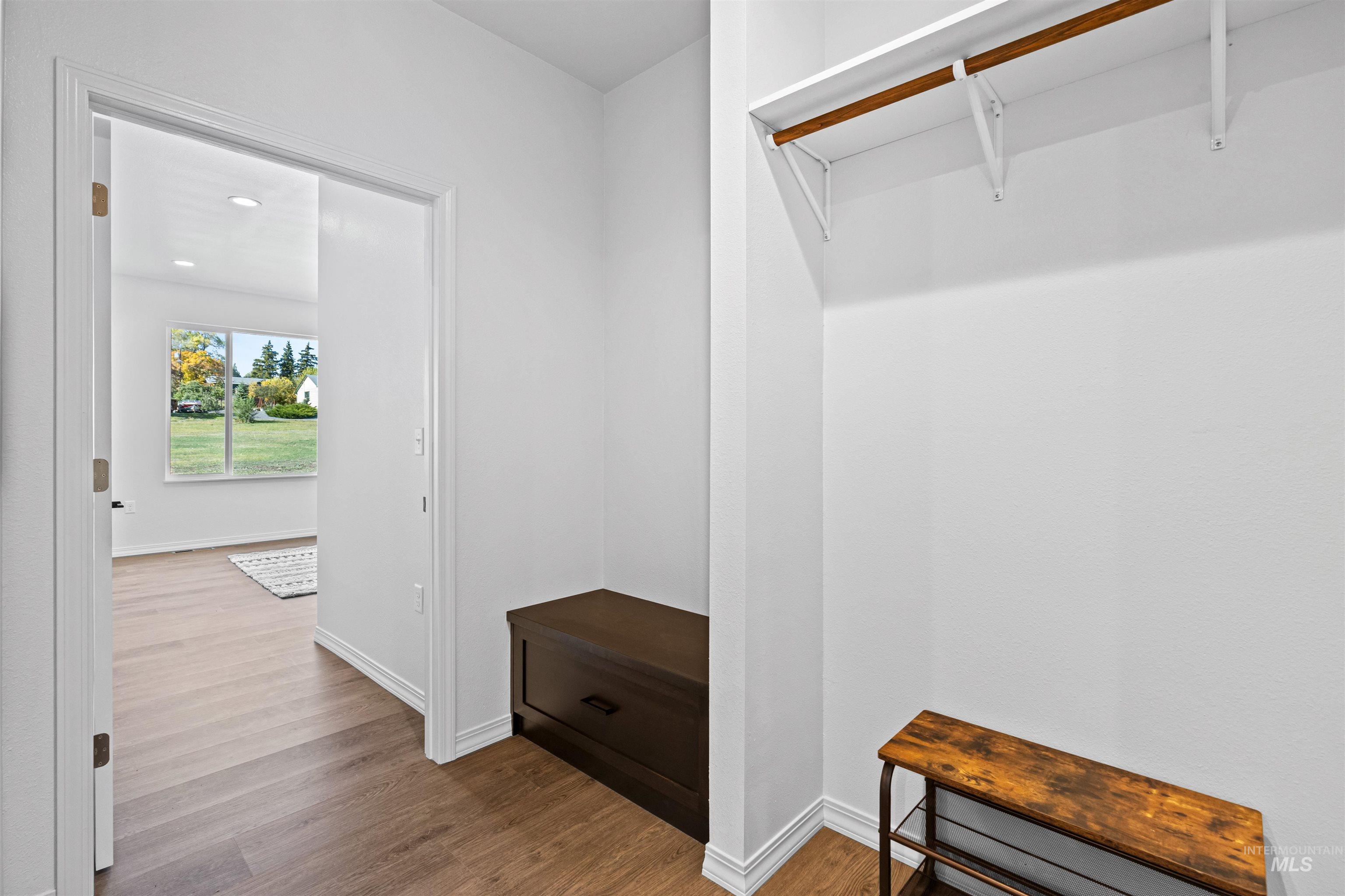 Spacious closet with wood finished floors