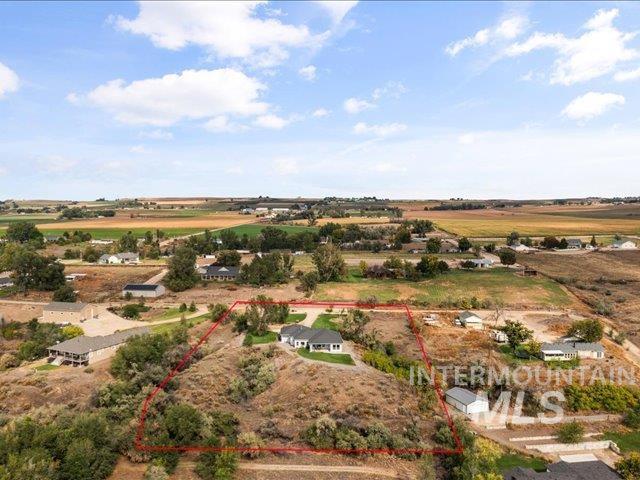 Overview of rural landscape with property parcel outlined
