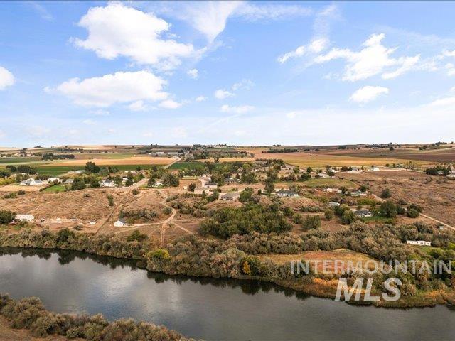 View of rural area featuring a nearby body of water