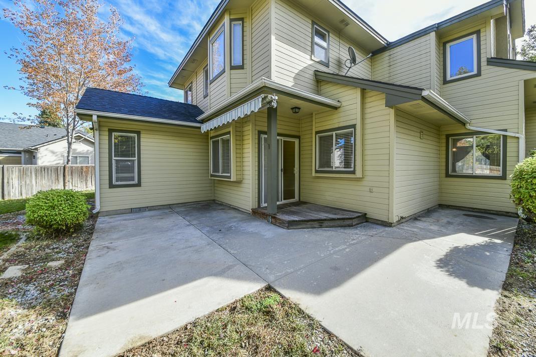 Back of property featuring a patio