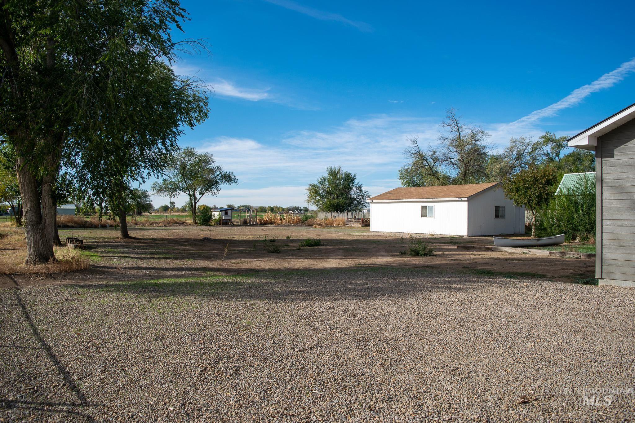 View of yard with an outdoor structure