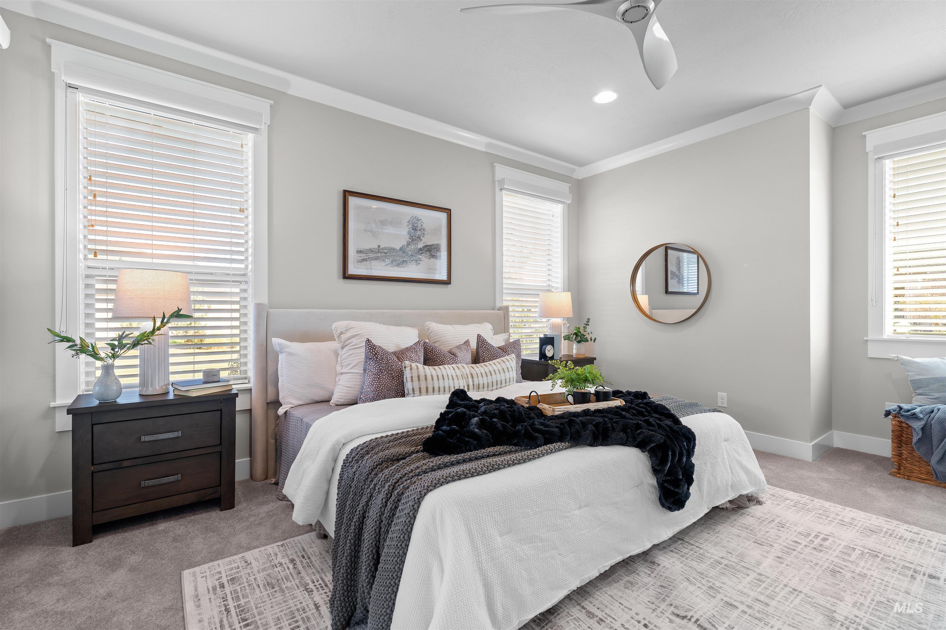 Bedroom featuring light carpet, ceiling fan, ornamental molding, and recessed lighting